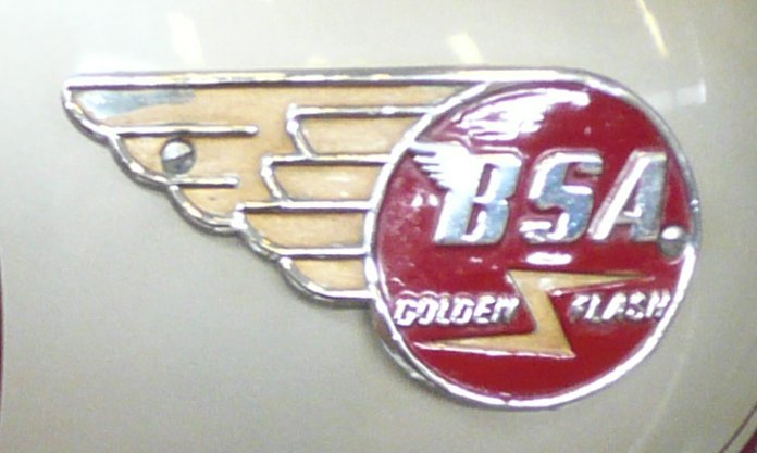 BSA A10 Golden Flash tank badge: a chrome wing joined to a red roundel with a winged BSA and a Golden Flash lightning bolt