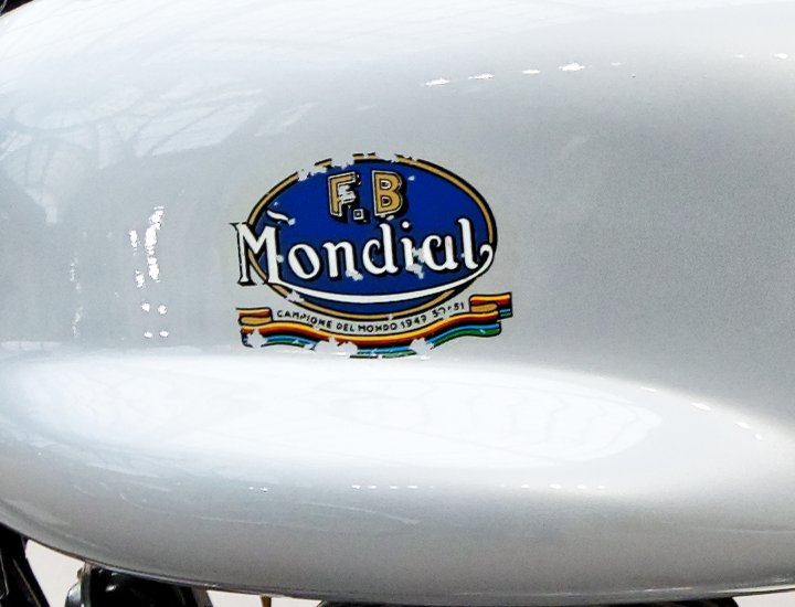 Blue F.B Mondial tank transfer reading Campione del Mondo 1949 50 51 on a silver 175 tank
