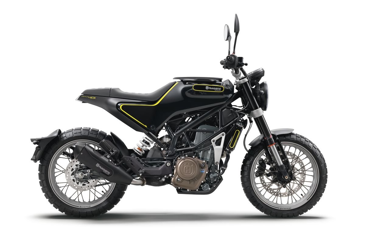 Black Husqvarna Svartpilen 401 with yellow accents and a small crown-H and Husqvarna wordmark on the tank