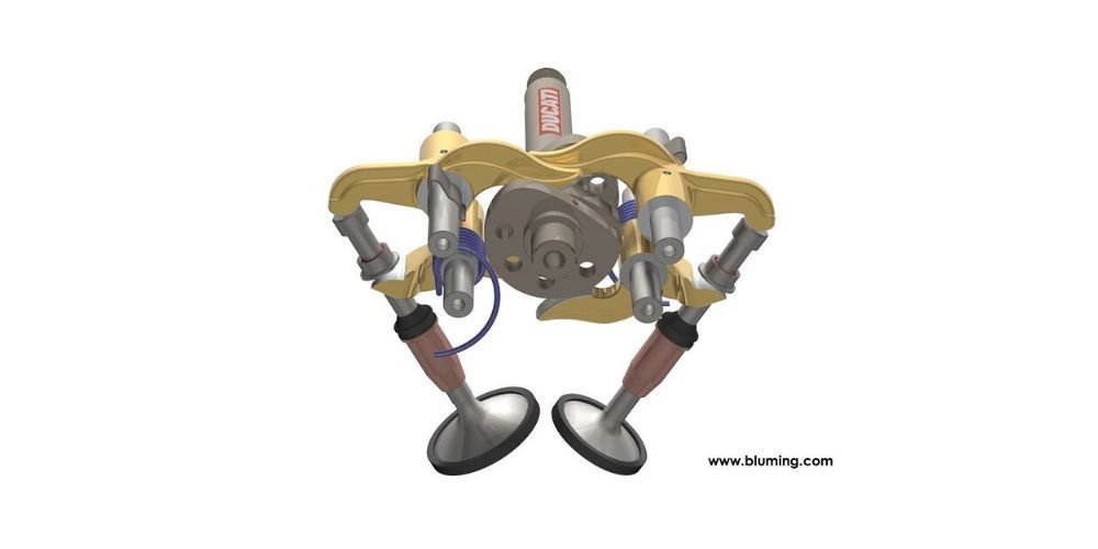 A detailed engine component assembly in yellow, gray, and brown against a white background.