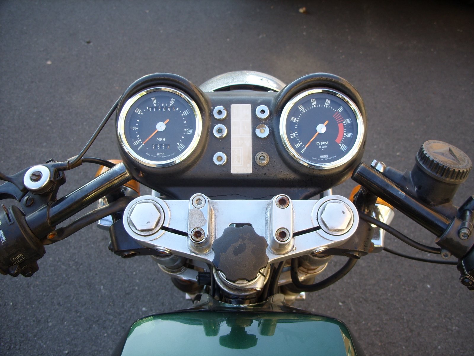 Clocks and clip-on handlebars on a 1975 Ducati 860 GT