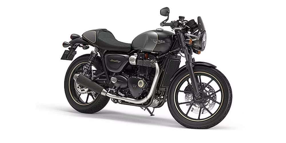 A black motorcycle is parked on a white background.
